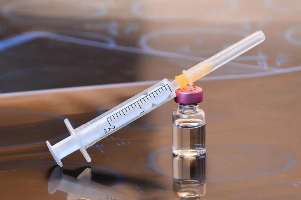 Botox and dermal filler vial with a syringe, representing Botox Kennesaw GA treatments at 32 Beauty Med Spa